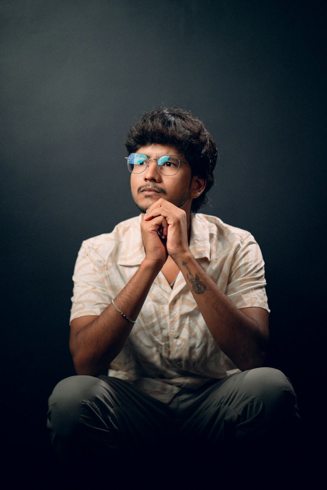 Danish male photo editor with glasses in studio