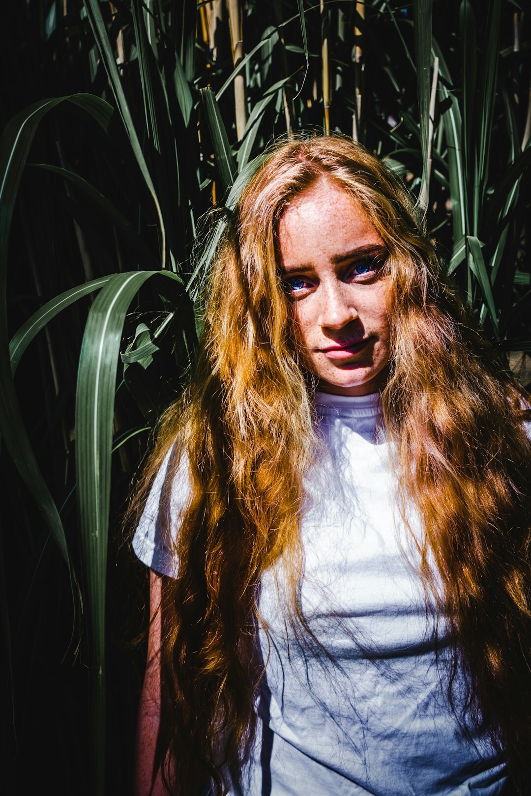 Young Danish female photographer with curly hair