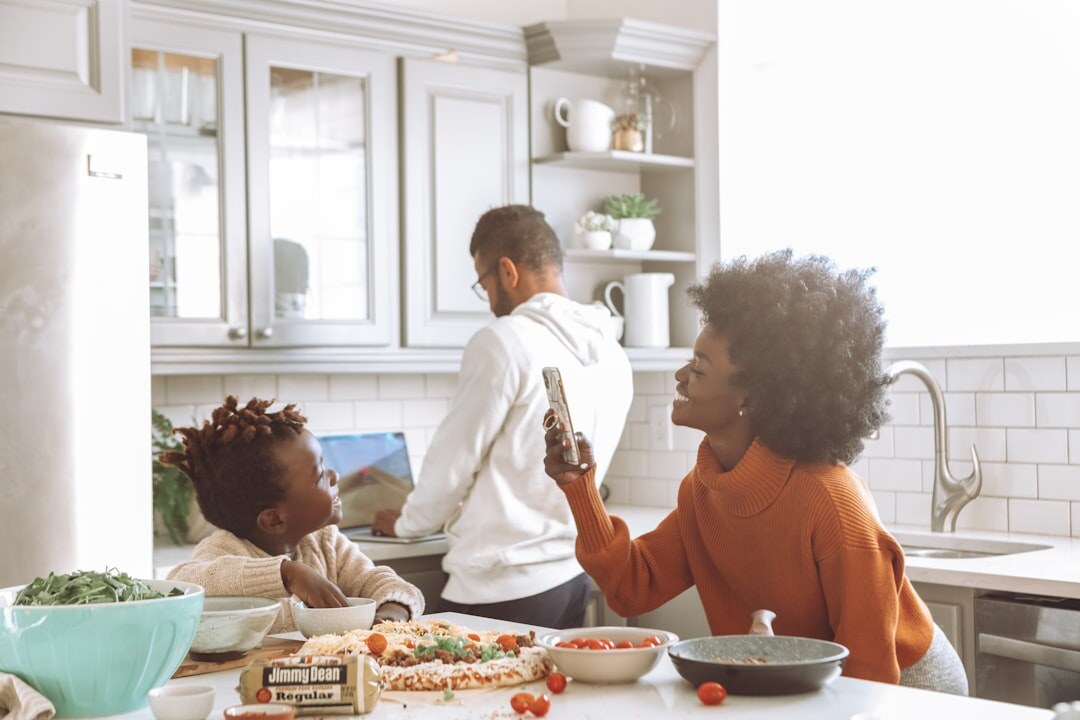family in home kitchen